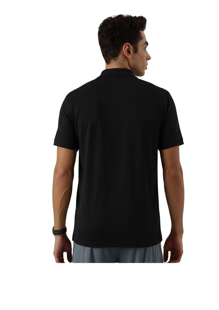 Back view of a  Man wearing a black polo shirt on a white background