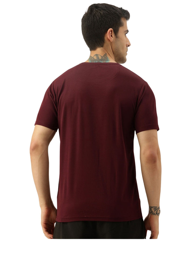 A man shown from the back wearing a short-sleeve crew-neck t-shirt in maroon, paired with black shorts, against a plain white background.