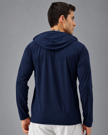 A man shown from the back wearing a navy long-sleeve hooded athletic top, paired with light gray shorts, against a plain white background.